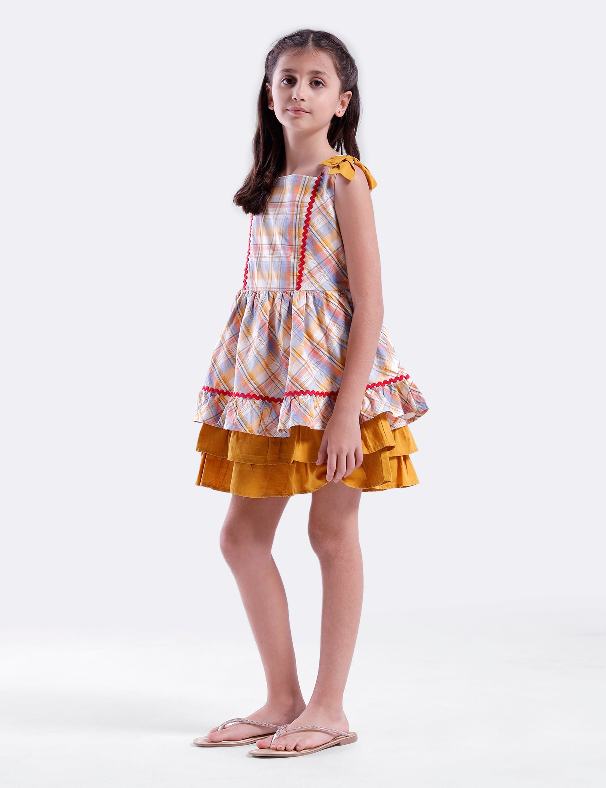 Girls checked dress with plain hem panel