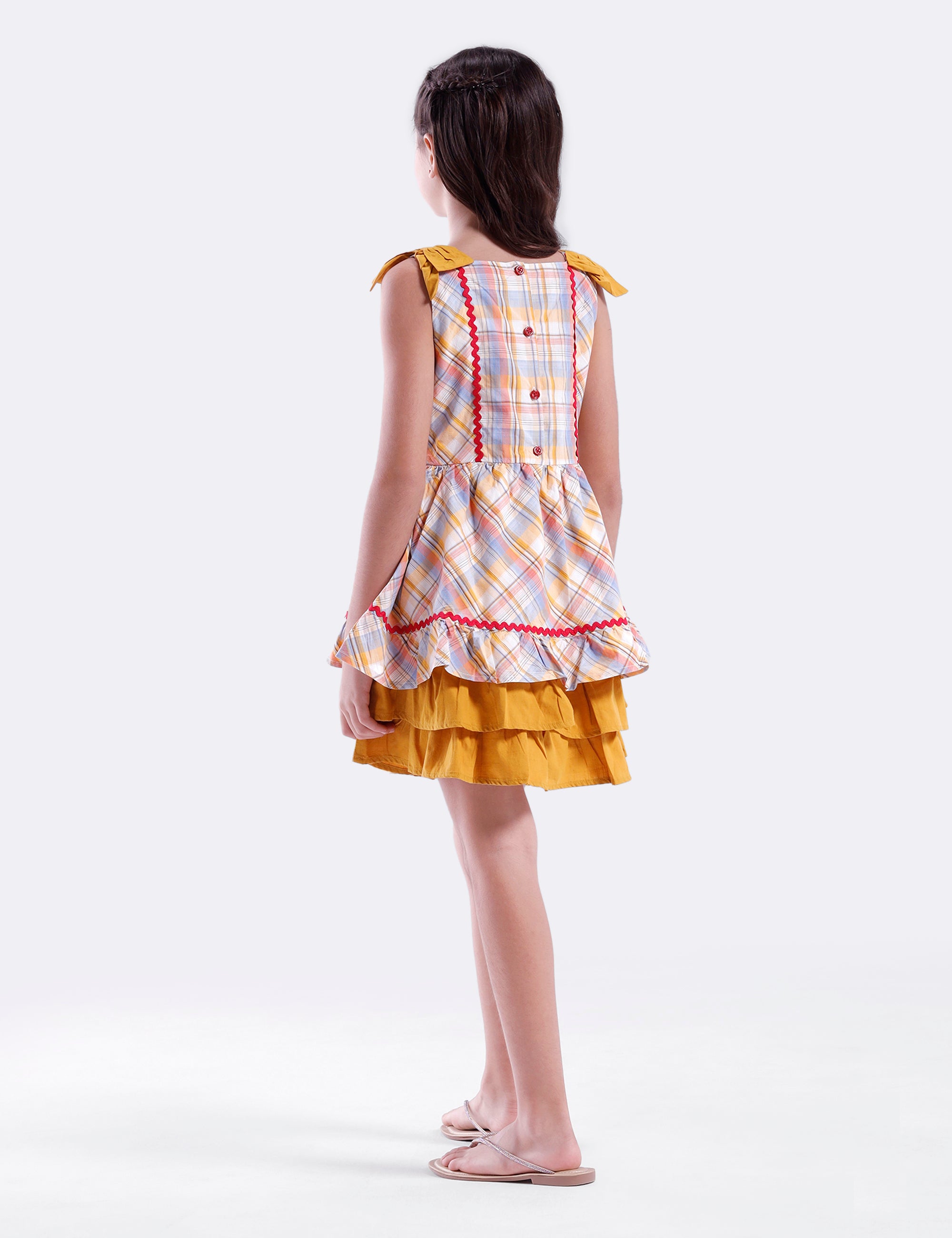 Girls checked dress with plain hem panel