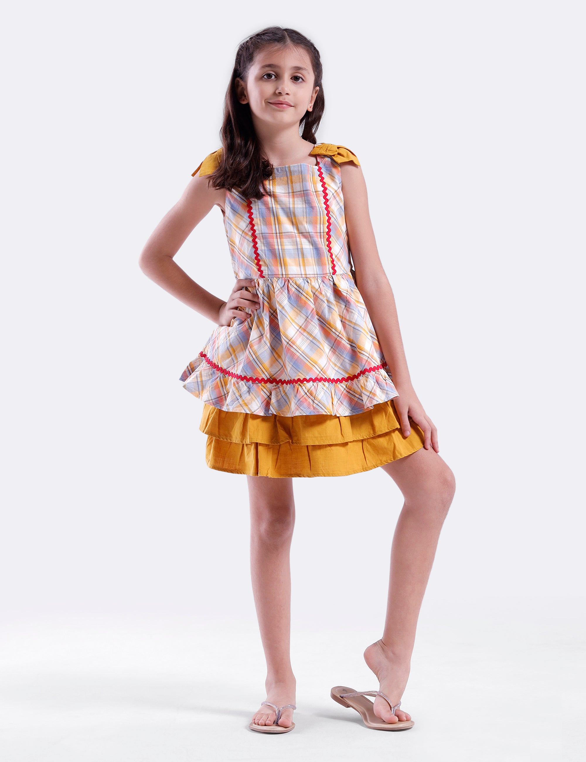 Girls checked dress with plain hem panel