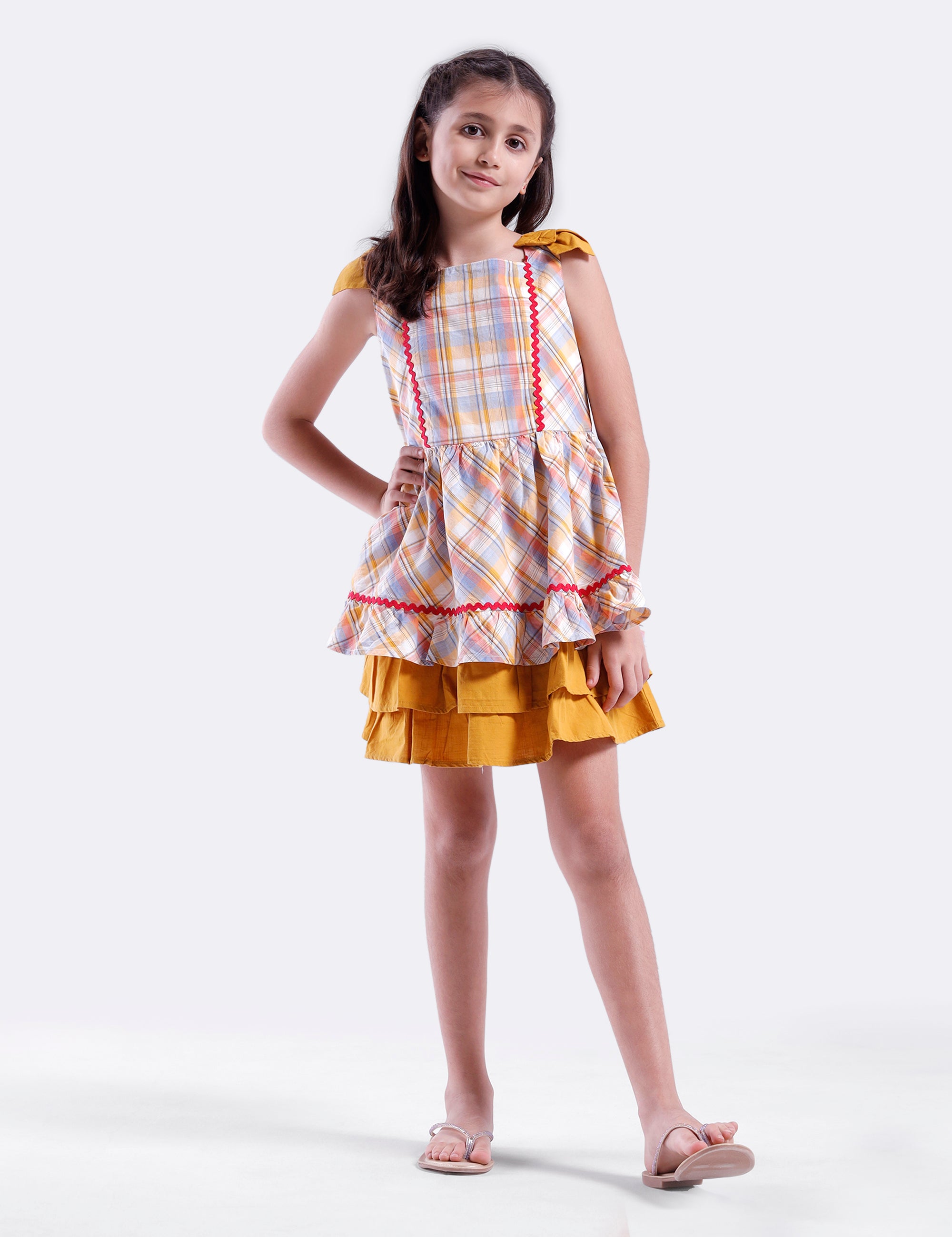 Girls checked dress with plain hem panel